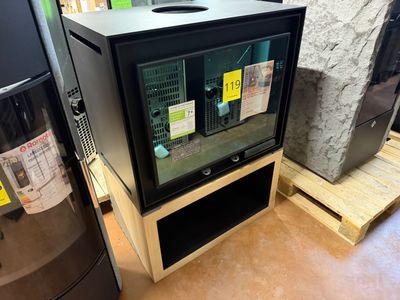 a refrigerator and a refrigerator freezer sitting in a room