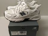 brand new balance shoes in box on table with white background