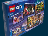 a box with a lego city christmas scene on it