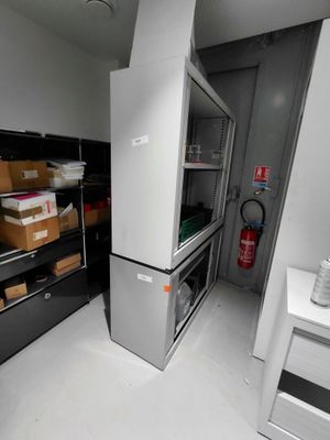 an image of a kitchen with a refrigerator and a stove