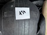a ball and a pair of shoes on the ground