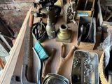 a wooden table with tools on top of it