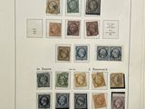 an open book with a bunch of different stamps on it