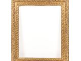 an old gold frame with a white background and a white wall