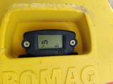a close up of a yellow box with a digital clock on it