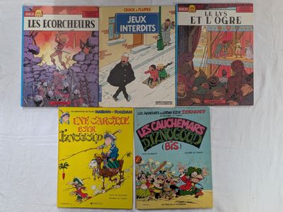 plusieurs livres pour enfants sont alignés sur une surface blanche