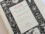an open book with a picture of a woman in a dress on it