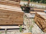 several pieces of wood are stacked on top of each other