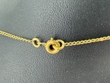 a close up of a gold chain bracelet on a mannequin mannequin mannequin mannequin mannequin mannequin mannequin mann