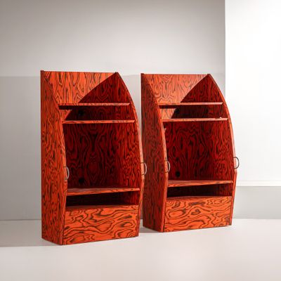 two bookshelves that are made out of plywood plywood