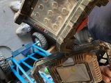 a man that is working on a piece of equipment
