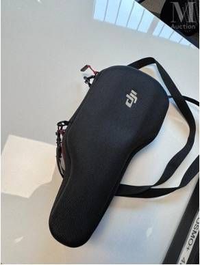 a black bag that is sitting on a table