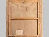 an old wooden frame with a piece of paper attached to it