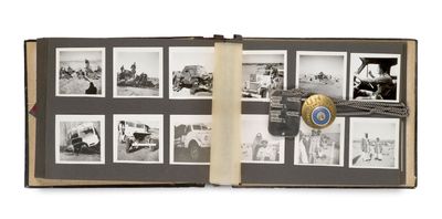 an open book with pictures of people and a badge on it