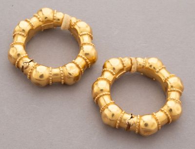 pair of gold - plated hoop earrings with beading