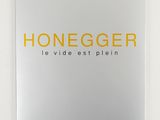 the cover of a book with the words honegger on it