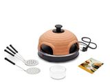 an image of a pizza oven with a pizza pan and utensils