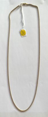 yellow and white necklace with a yellow tag on it on a white surface