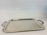 silver plated serving tray with handles and handles on a white surface