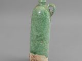 an image of a green vase with a handle on a gray background