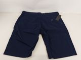 the children ' s navy shorts are lined up and ready to be worn