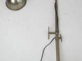 a lamp that is on a table with a cord