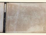 an old book opened to reveal a picture of a cat