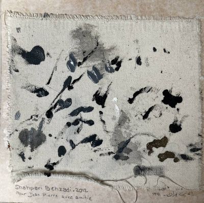 a picture of a piece of paper with ink splatters on it