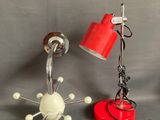 three different types of desk lamps on a table