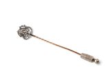 an image of a pin with a flower design on it