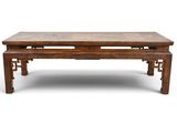 an old wooden table with a bench underneath it on a white background