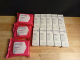 several packets of soap sitting on top of a table next to each other