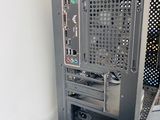 a computer on a table with a keyboard and mouse on it