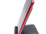 a cell phone that is sitting on a stand