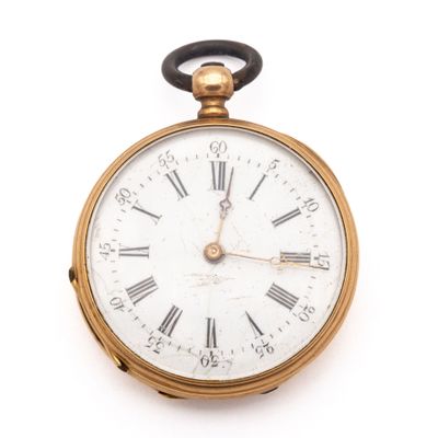 une montre de poche en or avec des chiffres romains sur le cadran