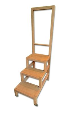 a wooden step stool with a mirror on it