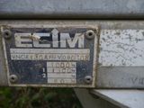 a close up of a metal plate on a machine