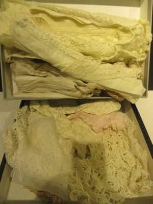 a box full of clothes that is sitting on a table