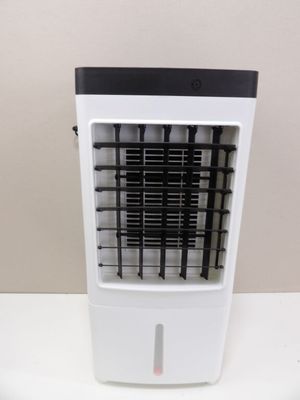 a white and black air cooler sitting on a table