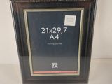 framed picture of a picture of a clock with a date on it