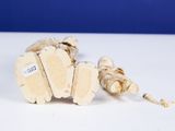 a close up of a wooden object on a table