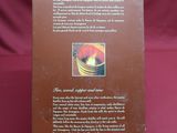 the back cover of a book with a picture of a boat in the water