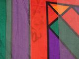 a colorful painting on the wall of a building