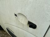 a car that has a hole in the side of it