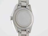 an image of a close up of a wrist watch on a white surface