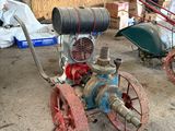 un petit moteur qui traîne dans un garage