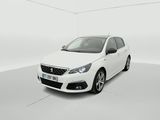 a white car in a white room with a white floor