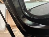 a close up of a car door with a window open