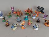 a lot of figurines that are sitting on a table
