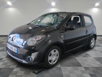 a picture of a small black car on a checkered floor